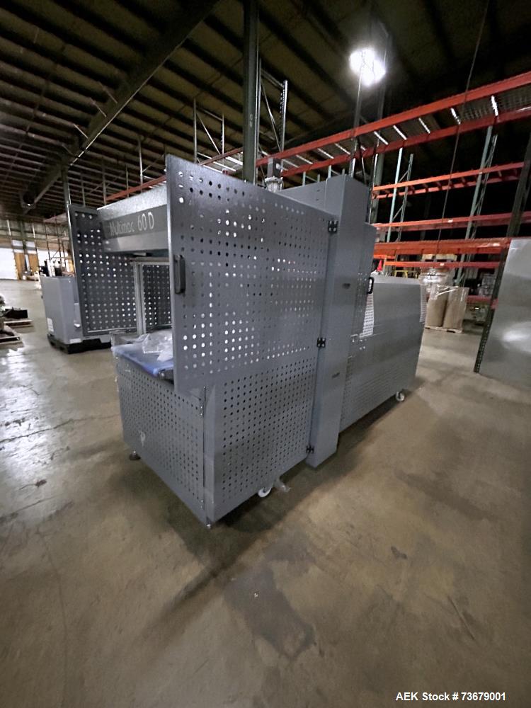 Used Maripak Bundler/Bander, Model Multimac 60D Servo. Up to 35 cycles/minute. 16" (400mm) seal bar opening. 65'/minute maximum conveyor speed. 14" maximum roll diameter (adjustable). 38" working hei...