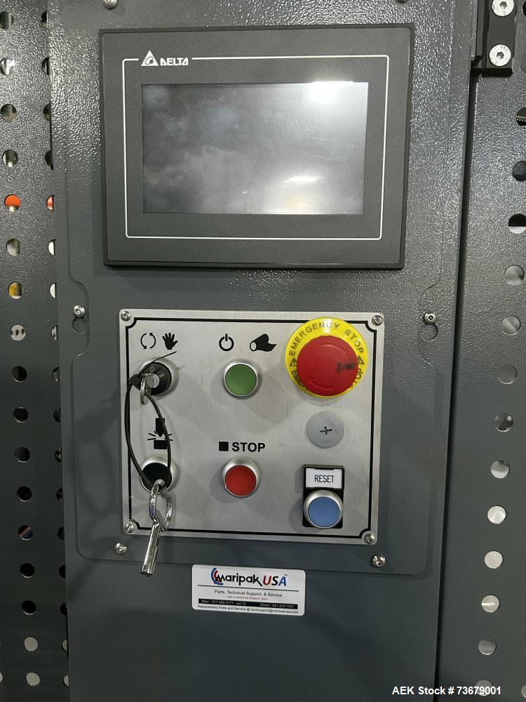 Used Maripak Bundler/Bander, Model Multimac 60D Servo. Up to 35 cycles/minute. 16" (400mm) seal bar opening. 65'/minute maximum conveyor speed. 14" maximum roll diameter (adjustable). 38" working hei...
