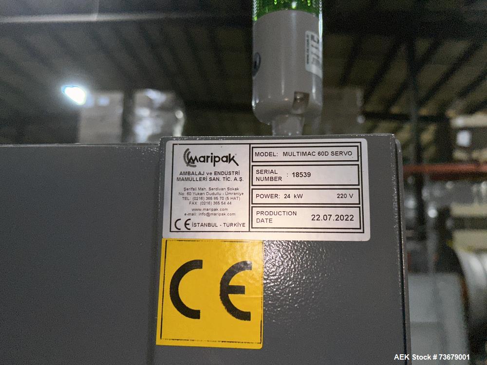 Used Maripak Bundler/Bander, Model Multimac 60D Servo. Up to 35 cycles/minute. 16" (400mm) seal bar opening. 65'/minute maximum conveyor speed. 14" maximum roll diameter (adjustable). 38" working hei...