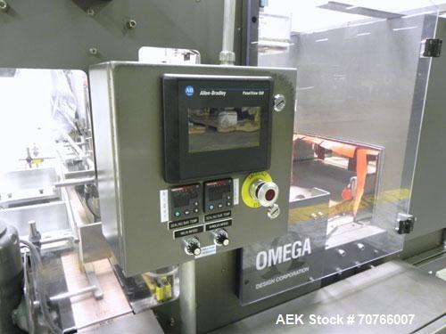 Used Omega Design Model DL-36 Dual Lane High Speed Shrink Bundler. Capable of speeds from 200 - 240 containers per minute. Is of stainless steel construction. Max product height: up to 11". Max film ...