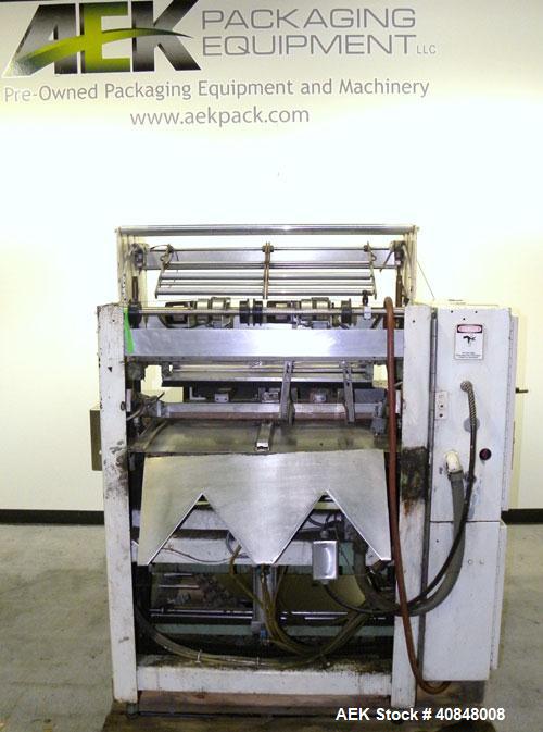 Used Omega Design Model DL-27 Dual Lane Shrink Bundler. Capable of speeds from 200 to 240 BPM (depending on product size and pattern). Has a Max film width of 26". Maximum product Height: up to 11".H...