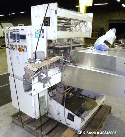 Used Omega Design Model DL-27 Dual Lane Shrink Bundler. Capable of speeds from 200 to 240 BPM (depending on product size and pattern). Has a Max film width of 26". Maximum product Height: up to 11".H...