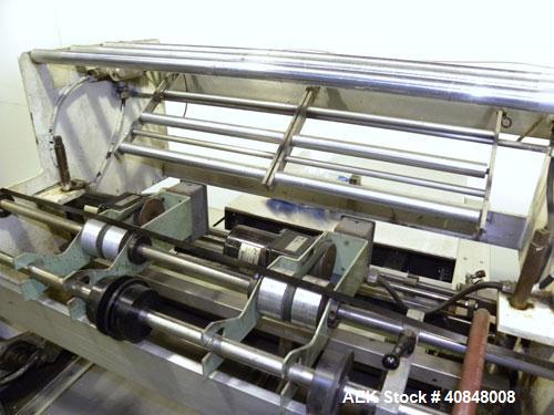Used Omega Design Model DL-27 Dual Lane Shrink Bundler. Capable of speeds from 200 to 240 BPM (depending on product size and pattern). Has a Max film width of 26". Maximum product Height: up to 11".H...
