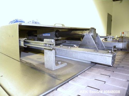Used Omega Design Model DL-27 Dual Lane Shrink Bundler. Capable of speeds from 200 to 240 BPM (depending on product size and pattern). Has a Max film width of 26". Maximum product Height: up to 11".H...