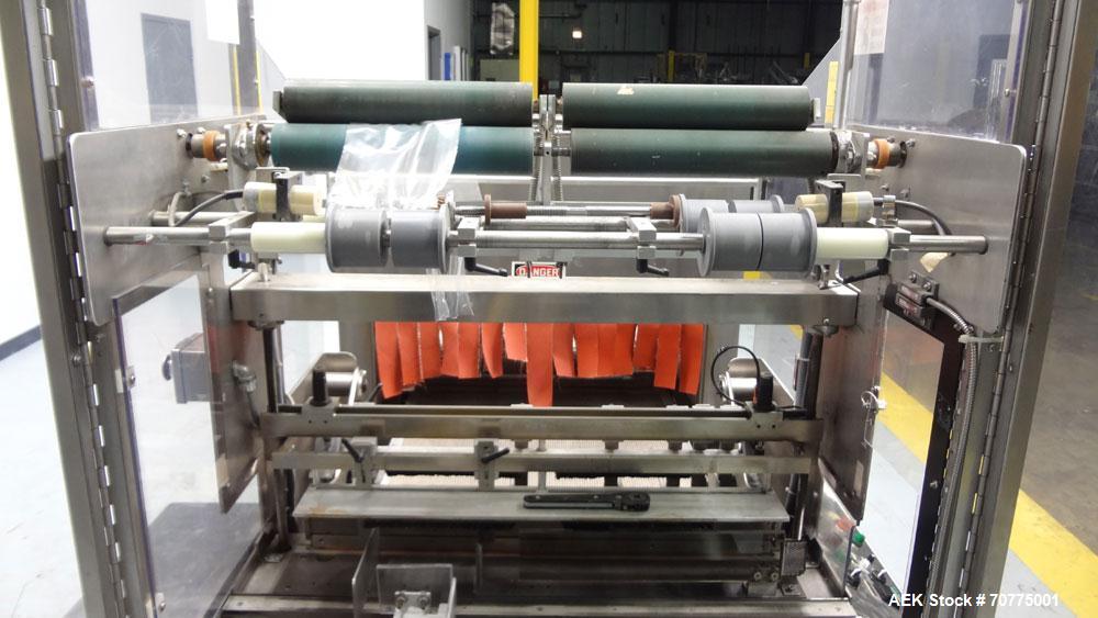 Used Omega Design Model DL-27 Dual Lane Shrink Bundler. All Stainless Steel constriction. Capable of speeds from 10-40 (20 cycles max)  bundles per minute, depending on configuration. Designed for du...