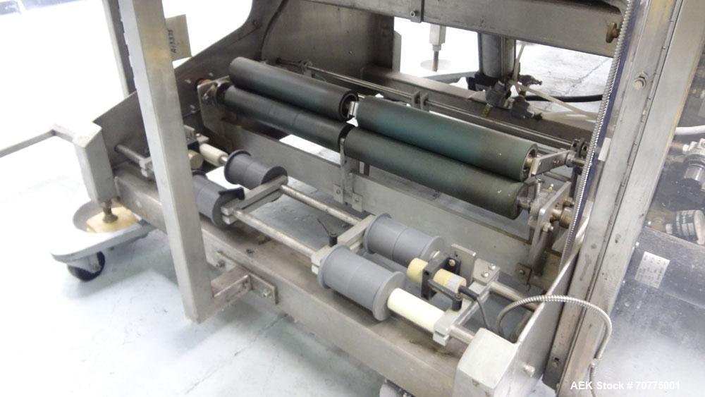 Used Omega Design Model DL-27 Dual Lane Shrink Bundler. All Stainless Steel constriction. Capable of speeds from 10-40 (20 cycles max)  bundles per minute, depending on configuration. Designed for du...