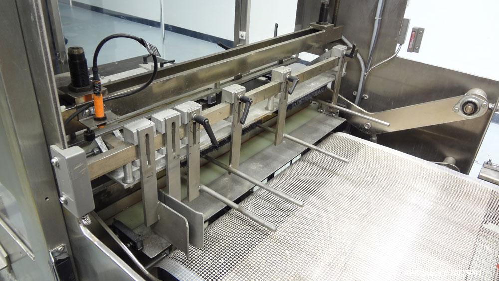 Used Omega Design Model DL-27 Dual Lane Shrink Bundler. All Stainless Steel constriction. Capable of speeds from 10-40 (20 cycles max)  bundles per minute, depending on configuration. Designed for du...