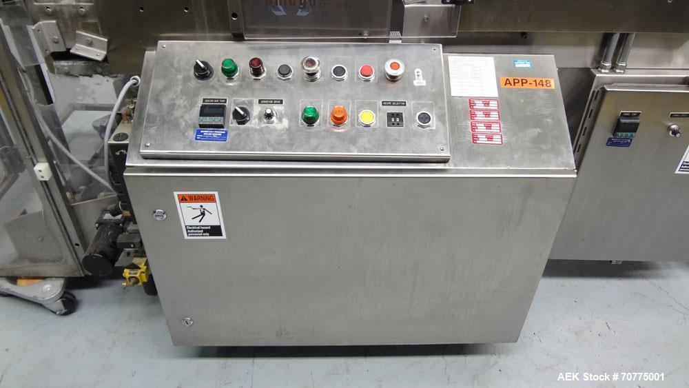 Used Omega Design Model DL-27 Dual Lane Shrink Bundler. All Stainless Steel constriction. Capable of speeds from 10-40 (20 cycles max)  bundles per minute, depending on configuration. Designed for du...