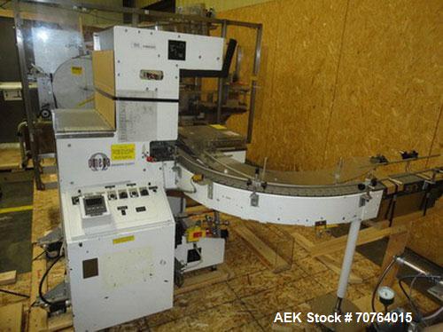 Used Omega Design Model SL-18 Shrink Bundler capable of speeds from 120 - 150 containers per minute depending on container size and pack pattern. Single lane unit with right angle infeed and integrat...