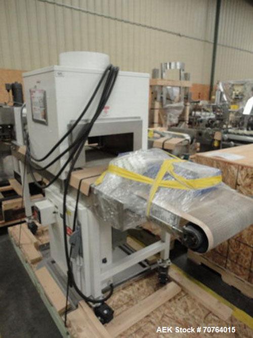 Used Omega Design Model SL-18 Shrink Bundler capable of speeds from 120 - 150 containers per minute depending on container size and pack pattern. Single lane unit with right angle infeed and integrat...