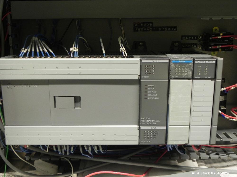 Used Omega Design Model SL-18 Single Lane Shrink Bundler. Machine is capable of speeds from 120 to 150 containers per minute. Has right angle infeed and integrated heat shrink tunnel. Has a maximum f...