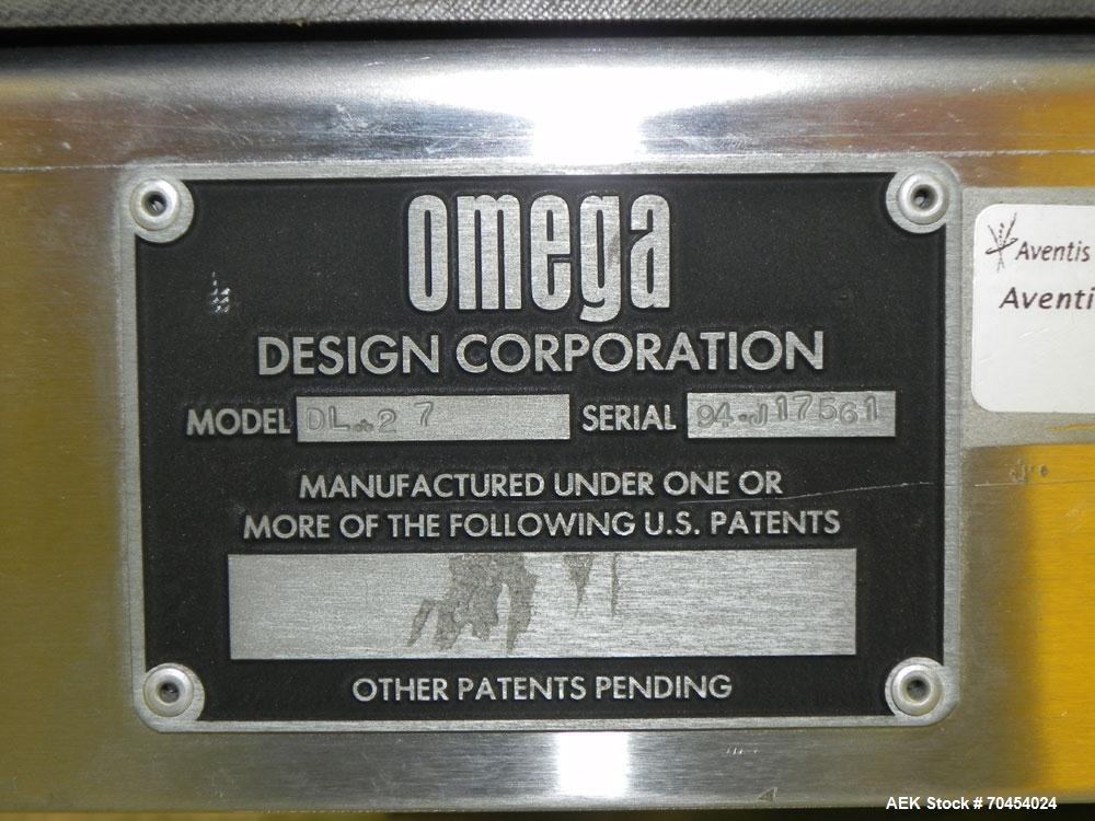Used Omega Design Model SL-18 Single Lane Shrink Bundler. Machine is capable of speeds from 120 to 150 containers per minute. Has right angle infeed and integrated heat shrink tunnel. Has a maximum f...
