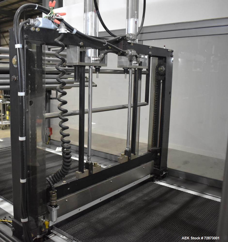 Used PMI (Arpac) Model SIB-35 Automatic Inline Shrink Bundler. Capable of speeds up to 30 bundles per minute (depending on application). Has a 35"W seal bar and 17" max height clearance. Tunnel apera...