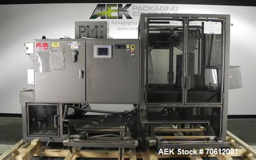 Used PMI Model SIC-30 Automatic Shrink Bundler & Shrink Tunnel. Machine is rated at up to 30 packages per minute. Tray wrapper has a30" seal bar. Has a glass-filled/nylon mech conveyor belt. Has a hi...