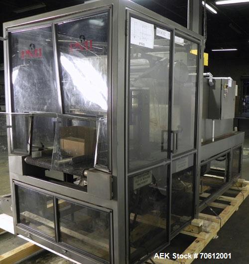 Used PMI Model SIC-30 Automatic Shrink Bundler & Shrink Tunnel. Machine is rated at up to 30 packages per minute. Tray wrapper has a30" seal bar. Has a glass-filled/nylon mech conveyor belt. Has a hi...