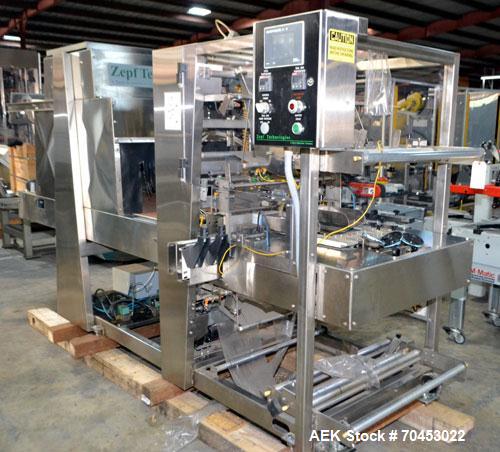 Used ZEPF Technologies SA-27DL Dual Lane Automatic Shrink Bundler. Model SA-27DL has a right angle dual lane infeed. Has 27"W seal bar and with an integrated shrink tunnel. Cooling Fan on discharge. ...