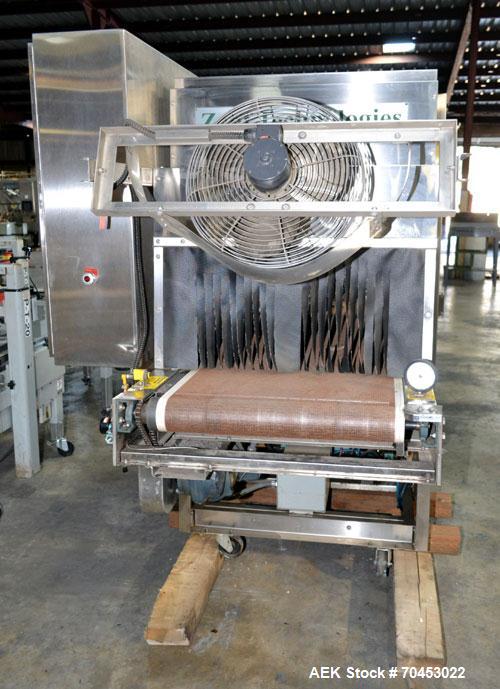 Used ZEPF Technologies SA-27DL Dual Lane Automatic Shrink Bundler. Model SA-27DL has a right angle dual lane infeed. Has 27"W seal bar and with an integrated shrink tunnel. Cooling Fan on discharge. ...