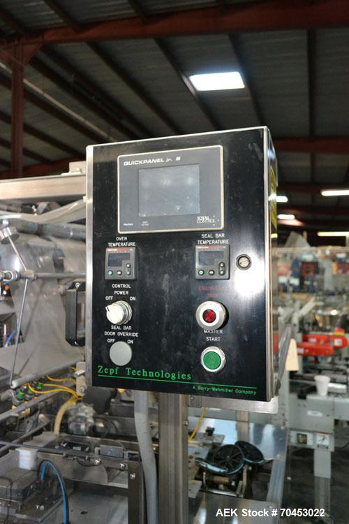 Used ZEPF Technologies SA-27DL Dual Lane Automatic Shrink Bundler. Model SA-27DL has a right angle dual lane infeed. Has 27"W seal bar and with an integrated shrink tunnel. Cooling Fan on discharge. ...