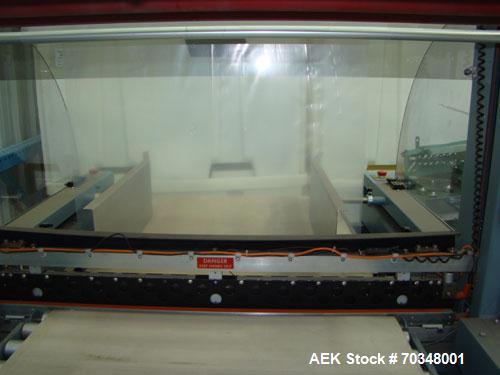 Used-Used: Shanklin B2BB shrink wrapper bundler with Shanklin T-9 shrink tunnel. Has 40 in seal jaw, AB Micrologics 1000 plc...