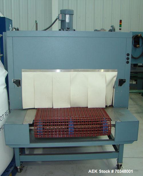 Used-Used: Shanklin B2BB shrink wrapper bundler with Shanklin T-9 shrink tunnel. Has 40 in seal jaw, AB Micrologics 1000 plc...