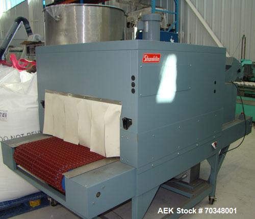 Used-Used: Shanklin B2BB shrink wrapper bundler with Shanklin T-9 shrink tunnel. Has 40 in seal jaw, AB Micrologics 1000 plc...