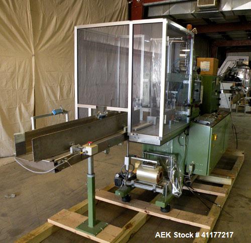 Used Skinetta Shrink Bundler, Model ASK300. Has a web width of 290mm. Maximum infeed width 380mm. Maximum height 290mm. Maximum length 350mm. Has a Z infeed, rear feed, to cross push to push straight...