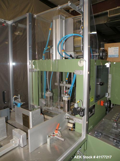 Used Skinetta Shrink Bundler, Model ASK300. Has a web width of 290mm. Maximum infeed width 380mm. Maximum height 290mm. Maximum length 350mm. Has a Z infeed, rear feed, to cross push to push straight...