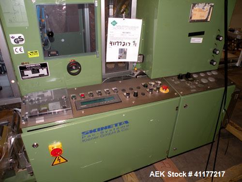 Used Skinetta Shrink Bundler, Model ASK300. Has a web width of 290mm. Maximum infeed width 380mm. Maximum height 290mm. Maximum length 350mm. Has a Z infeed, rear feed, to cross push to push straight...
