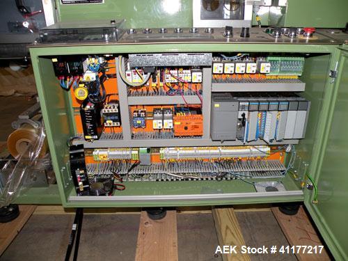 Used Skinetta Shrink Bundler, Model ASK300. Has a web width of 290mm. Maximum infeed width 380mm. Maximum height 290mm. Maximum length 350mm. Has a Z infeed, rear feed, to cross push to push straight...