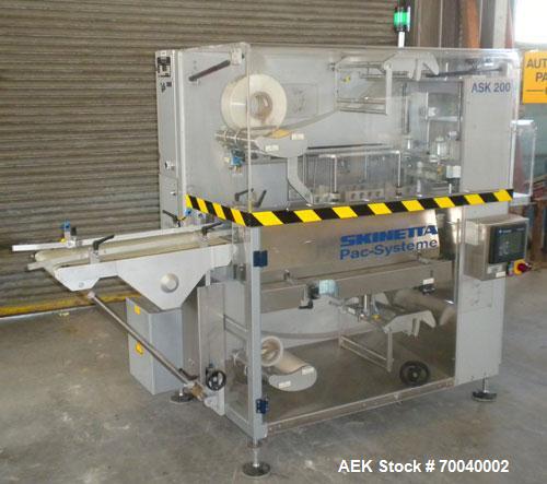 Used Skinetta Automatic Stretch Banding/ Shrink Bundle Machine, Model ASK200B, Serial #2517.02. Capable of speeds up to 20 cycles per minute. Will handle working film web width of 200 mm. Handles PE ...