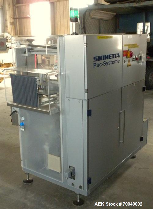 Used Skinetta Automatic Stretch Banding/ Shrink Bundle Machine, Model ASK200B, Serial #2517.02. Capable of speeds up to 20 cycles per minute. Will handle working film web width of 200 mm. Handles PE ...