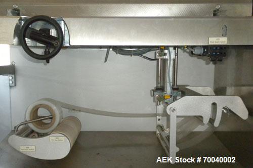 Used Skinetta Automatic Stretch Banding/ Shrink Bundle Machine, Model ASK200B, Serial #2517.02. Capable of speeds up to 20 cycles per minute. Will handle working film web width of 200 mm. Handles PE ...