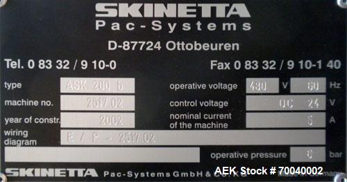 Used Skinetta Automatic Stretch Banding/ Shrink Bundle Machine, Model ASK200B, Serial #2517.02. Capable of speeds up to 20 cycles per minute. Will handle working film web width of 200 mm. Handles PE ...