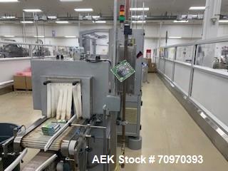 Used Skinetta (Christ Packaging) Model ASK2500 Shrink Bundler with Shrink Tunnel. Capable of speeds up to 40 cycles per minute. Maximum sealing width: up to 230mm. Maximum bundle height: up to 240mm....