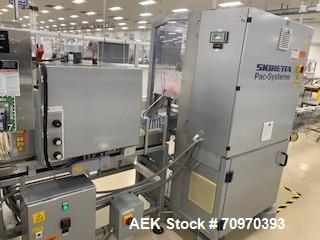 Used-Skinetta (Christ Packaging) Model ASK2500 Shrink Bundler with Shrink Tunnel. Capable of speeds up to 40 cycles per minu...