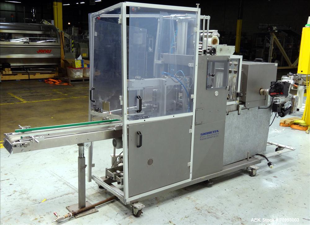 Used Skinetta (Christ Packaging) Model ASK300 Automatic single lane stretch/shrink film bundler. Capable of speeds up to 32 cycles per minute. Capable of a product size range (length) 75mm - 290mm (w...