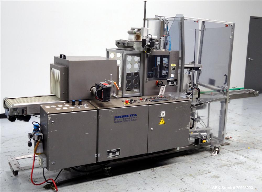 Used Skinetta (Christ Packaging) Model ASK300 Automatic single lane stretch/shrink film bundler. Capable of speeds up to 32 cycles per minute. Capable of a product size range (length) 75mm - 290mm (w...