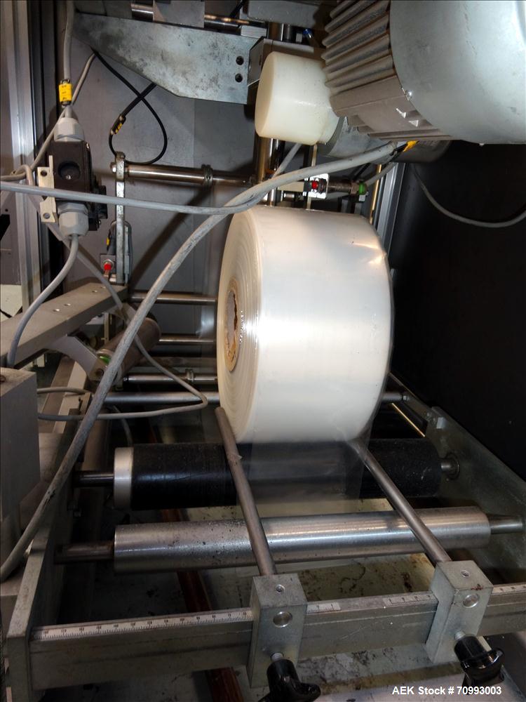 Used Skinetta (Christ Packaging) Model ASK300 Automatic single lane stretch/shrink film bundler. Capable of speeds up to 32 cycles per minute. Capable of a product size range (length) 75mm - 290mm (w...