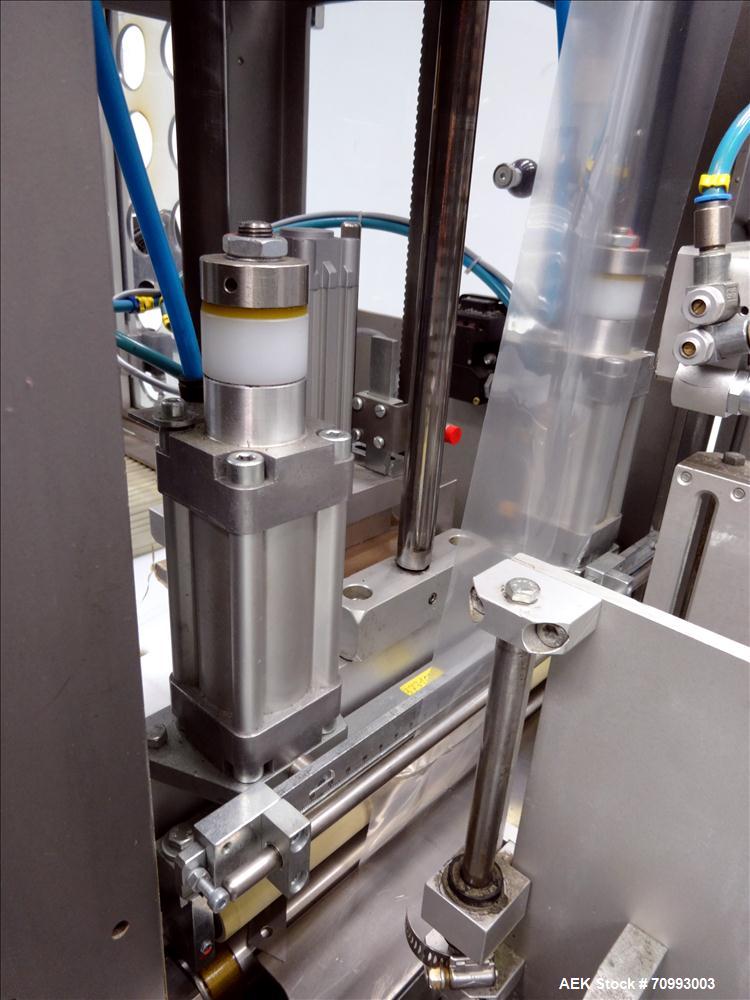 Used Skinetta (Christ Packaging) Model ASK300 Automatic single lane stretch/shrink film bundler. Capable of speeds up to 32 cycles per minute. Capable of a product size range (length) 75mm - 290mm (w...