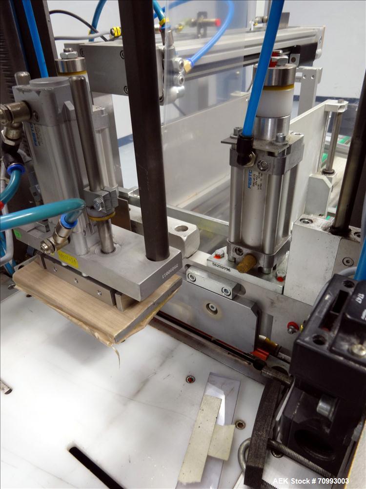 Used Skinetta (Christ Packaging) Model ASK300 Automatic single lane stretch/shrink film bundler. Capable of speeds up to 32 cycles per minute. Capable of a product size range (length) 75mm - 290mm (w...