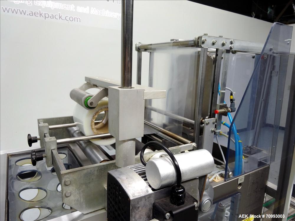 Used Skinetta (Christ Packaging) Model ASK300 Automatic single lane stretch/shrink film bundler. Capable of speeds up to 32 cycles per minute. Capable of a product size range (length) 75mm - 290mm (w...