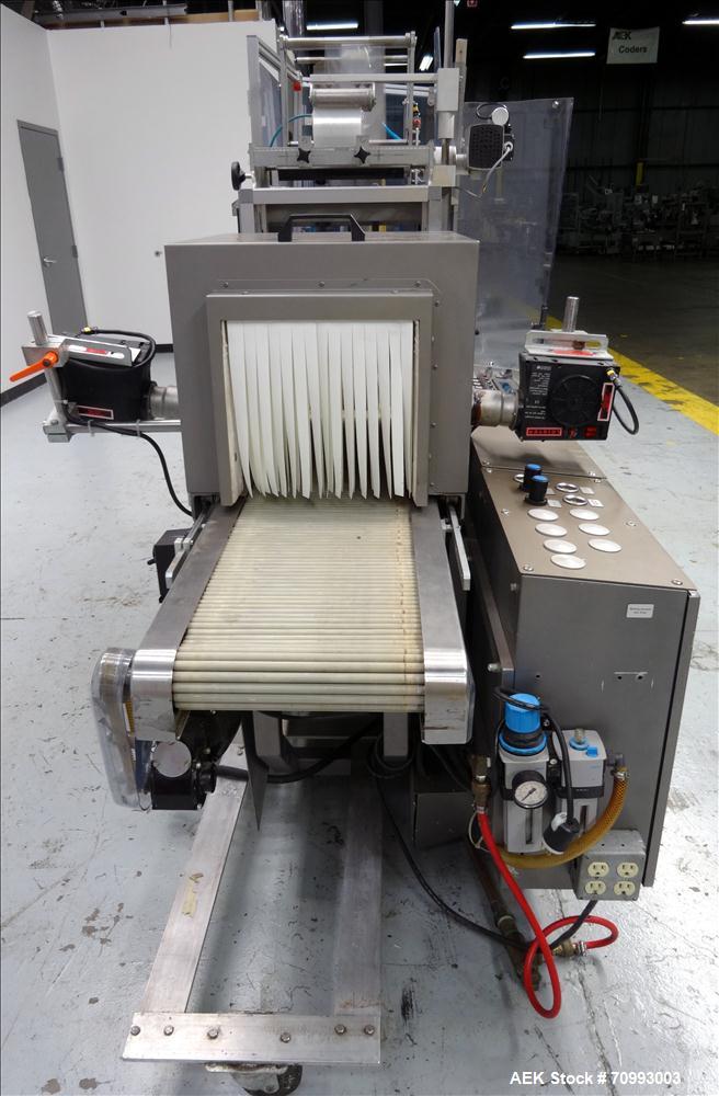 Used Skinetta (Christ Packaging) Model ASK300 Automatic single lane stretch/shrink film bundler. Capable of speeds up to 32 cycles per minute. Capable of a product size range (length) 75mm - 290mm (w...