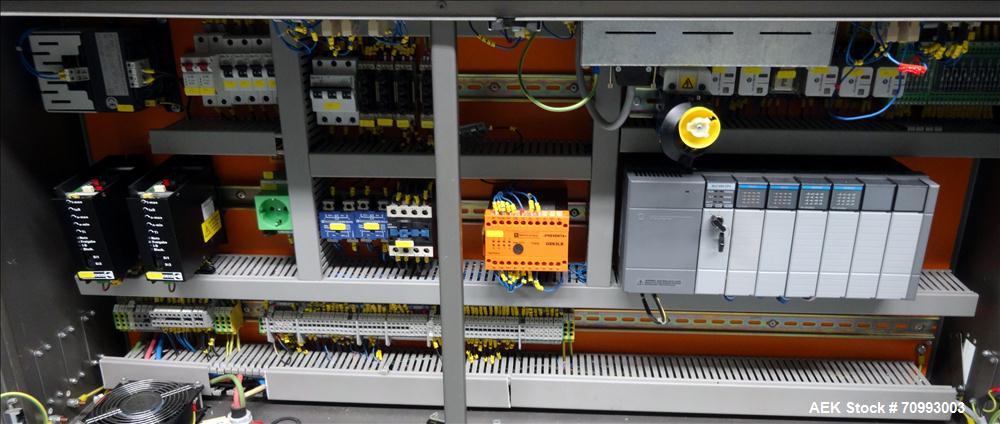 Used Skinetta (Christ Packaging) Model ASK300 Automatic single lane stretch/shrink film bundler. Capable of speeds up to 32 cycles per minute. Capable of a product size range (length) 75mm - 290mm (w...