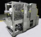 Used API Model DuraTech 2000-S-PH Pharmaceutical Shrink Bundler. Machine is capable of speeds up to 100 bottles/packages per minute (depending on pattern and size). Can handle containers up to 8