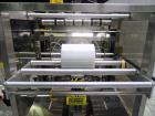 Used API Model DuraTech 2000-S-PH Pharmaceutical Shrink Bundler. Machine is capable of speeds up to 100 bottles/packages per minute (depending on pattern and size). Can handle containers up to 8