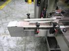 Used API Model DuraTech 2000-S-PH Pharmaceutical Shrink Bundler. Machine is capable of speeds up to 100 bottles/packages per minute (depending on pattern and size). Can handle containers up to 8