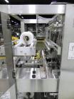Used API Model DuraTech 2000-S-PH Pharmaceutical Shrink Bundler. Machine is capable of speeds up to 100 bottles/packages per minute (depending on pattern and size). Can handle containers up to 8