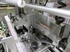 Used API Model DuraTech 2000-S-PH Pharmaceutical Shrink Bundler. Machine is capable of speeds up to 100 bottles/packages per minute (depending on pattern and size). Can handle containers up to 8