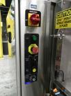 Used API Model DuraTech 2000-S-PH Pharmaceutical Shrink Bundler. Machine is capable of speeds up to 100 bottles/packages per minute (depending on pattern and size). Can handle containers up to 8