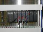 Used API Model DuraTech 2000-S-PH Pharmaceutical Shrink Bundler. Machine is capable of speeds up to 100 bottles/packages per minute (depending on pattern and size). Can handle containers up to 8
